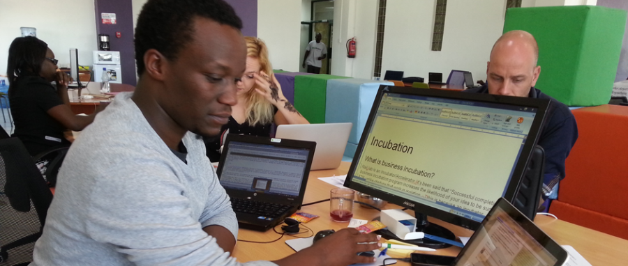 Sam Gichuru busy working