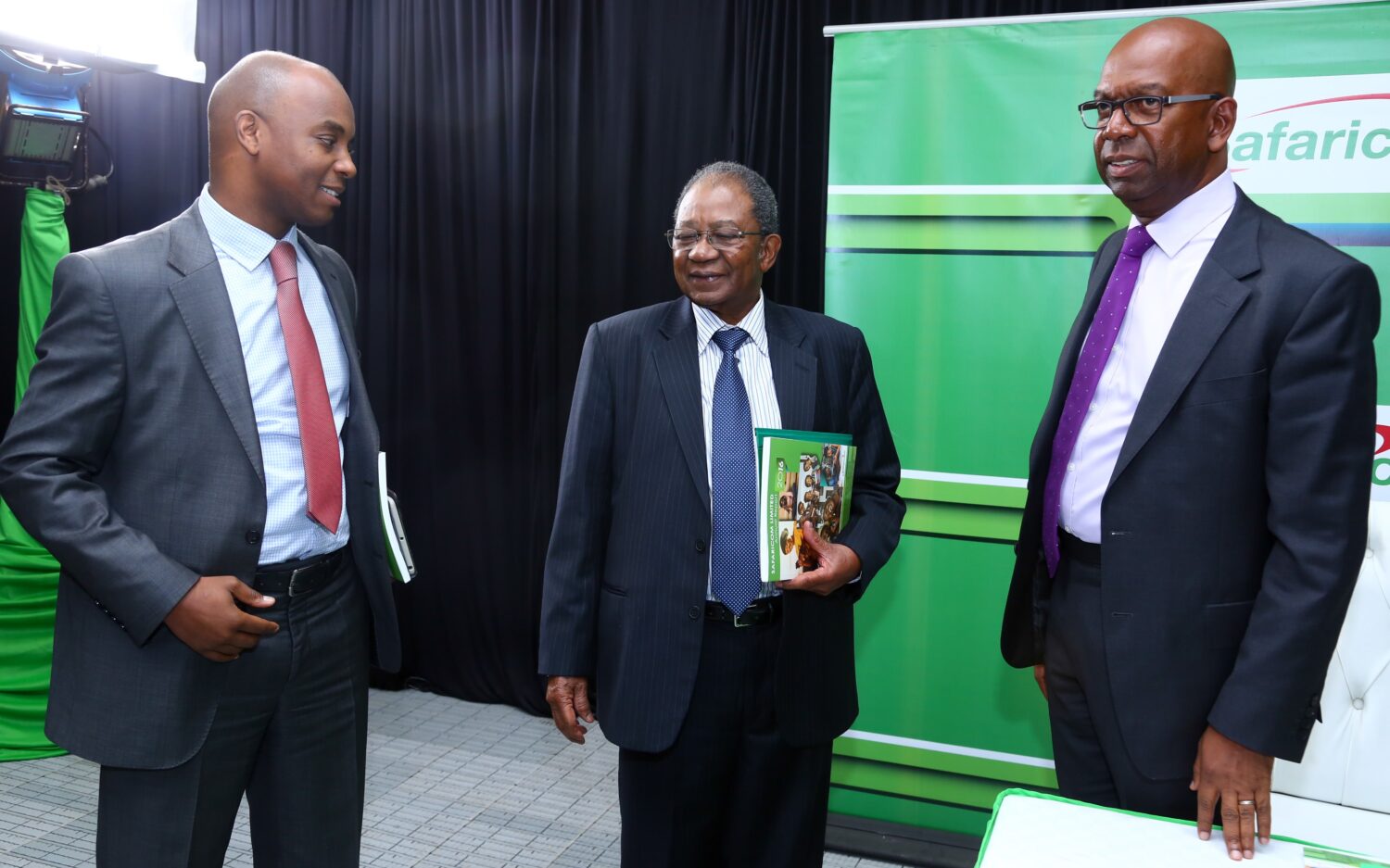 Safaricom CEO, Bob Collymore, Chairman, Board of Directors, Nicholas Nganga and Steve Chege, Director of Corporate Affairs during the release of Safaricom Limited Annual Report held at the Bomas of Kenya.