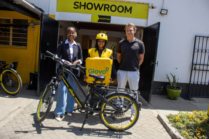 From left- Liz Wambua, Head of Operations Glovo Kenya together with Yvonne Muribi a glovo rider and Maarten Fonteijn, Managing Director eBee Afruca